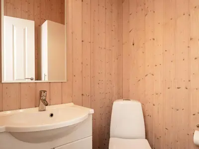 a bathroom with a sink and a toilet at 6 person holiday home in Vinderup-By Traum in Vinderup