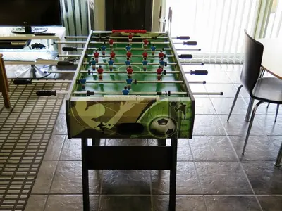 a glass table with a group of people on it at 6 person holiday home in Struer-By Traum in Remmer Strand