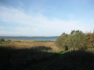 a view of the water from a field at 6 person holiday home in Roslev-By Traum in Flovtrup