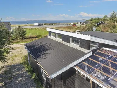 an overhead view of a house with a metal roof at 8 person holiday home in Løgstør-By Traum in Trend