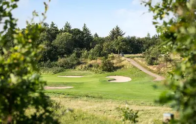 a view of a golf course with a green at 3 Bedroom Gorgeous Home In Skals in Skals