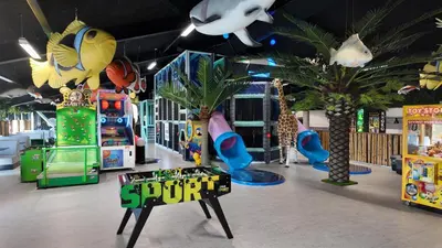 a childrens play area with different types of playground equipment at Funart 15 in Pandrup