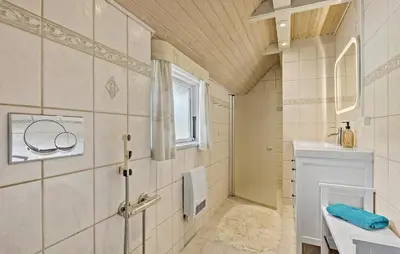 a bathroom with a shower and a sink at 3 Bedroom Stunning Home In Farsø in Farsø