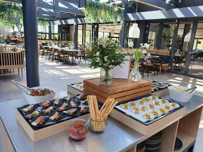 two trays of sushi on a table in a restaurant at Skønt Sommerhus Golfhytte midt i skønne omgivelser in Gatten