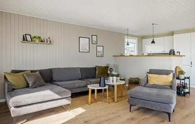 a living room with a couch and two chairs and a table at Cozy Home In Lemvig With Wifi in Lemvig