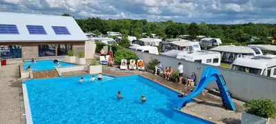 an aerial view of a swimming pool at a resort at Premium hytte med udendørs spa in Farsø