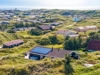 an aerial view of a village with houses at Holiday Home Naema - 400m from the sea by Interhome in Blokhus