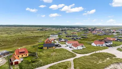 an aerial view of a small village with houses at Lovely Holiday Home With Panoramic Views Of The North Sea in Frøstrup
