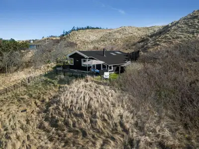 an aerial view of a house on a hill at Holiday Home Sella - 600m from the sea by Interhome in Blokhus