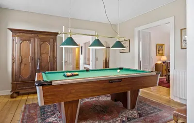 a living room with a pool table in it at 5 Bedroom Lovely Home In Bøvlingbjerg in Bøvlingbjerg