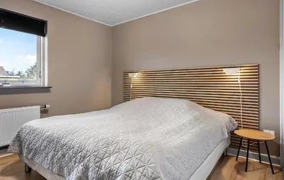 a bedroom with a white bed and a window at Amazing Home In Vestervig With Wifi in Vestervig