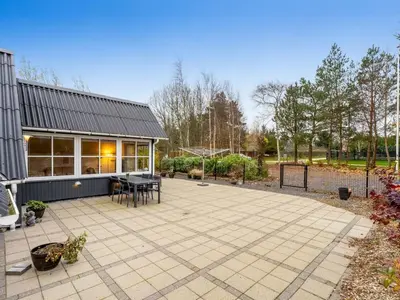 a patio in front of a house at Holiday Home Adisl - 600m to the fjord by Interhome in Løgsted