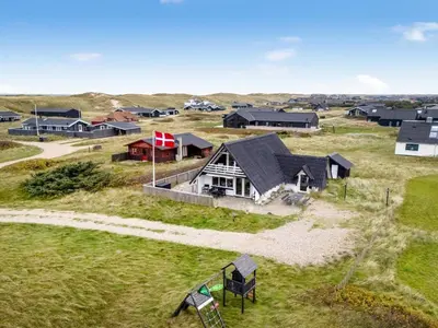an aerial view of a village with a house at Holiday Home Kaja - 150m from the sea by Interhome in Harboør
