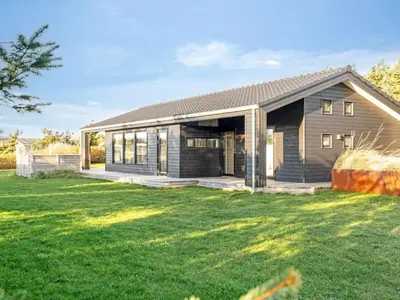 a house with a large yard at Holiday Home Godja - 300m from the sea by Interhome in Torsted
