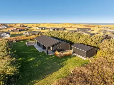 an aerial view of a house with a yard at Holiday Home Godja - 300m from the sea by Interhome in Torsted