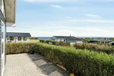 a view of the house from the driveway at Cozy Home By Limfjord With Bathing Jetty in Snedsted