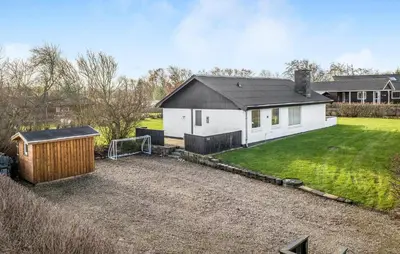 a white house with a large yard in front of it at Gorgeous Home In Vinderup With Wifi in Vinderup