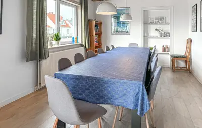a dining room with a blue table and chairs at Gorgeous Home In Thisted With Wifi in Thisted