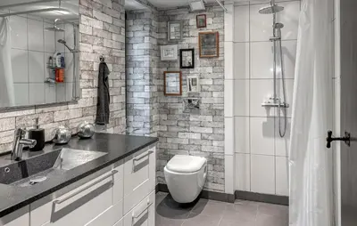 a bathroom with a toilet and a sink and a shower at 2 Bedroom Beautiful Home In Vinderup in Vinderup