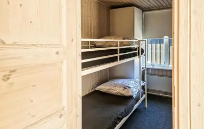 a bunk bed room with two bunk beds at 3 Bedroom Cozy Home In Løkken in Løkken