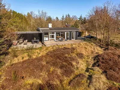 an aerial view of a house on a hill at Lovely Holiday Home With Panoramic View Of The Fjord in Amtoft