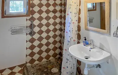 a bathroom with a sink and a shower at 4 Bedroom Amazing Home In Hurup Thy in Sønder Ydby