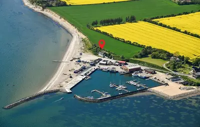 an aerial view of a marina with boats in the water at Nice Home In Øster Assels in Øster Assels
