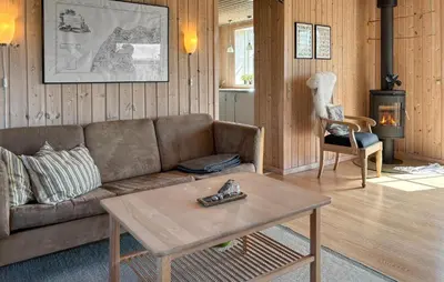 a living room with a couch and a coffee table at 3 Bedroom Nice Home In Fjerritslev in Fjerritslev