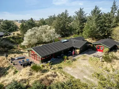 an overhead view of a home with a roof at Holiday Home Nimrod - 800m from the sea by Interhome in Blokhus