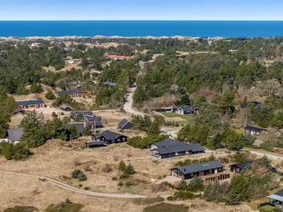 an aerial view of a house on a hill at Holiday Home Heidl - 2km from the sea by Interhome in Blokhus
