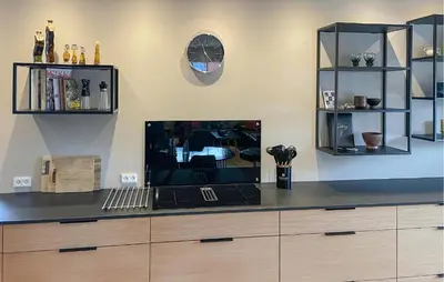 a large entertainment center with a tv on top of it at Cozy Home In Thyborøn With Wifi in Thyborøn