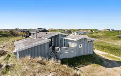 a house on the side of a hill at Stunning Home In Blokhus With Wifi in Blokhus