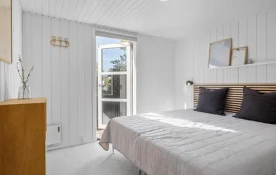 a white bedroom with a bed and a window at Stunning Home In Saltum With Wifi in Saltum