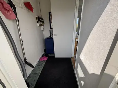 a room with a hallway with a door and a hallway at Holiday Home Wighlek - 800m from the sea by Interhome in Snedsted