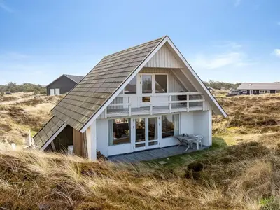 a house on the beach with a gambrel roof at Holiday Home Wighlek - 800m from the sea by Interhome in Snedsted