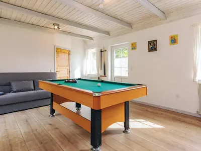 a living room with a pool table in it at 6 person holiday home in Vestervig in Vestervig