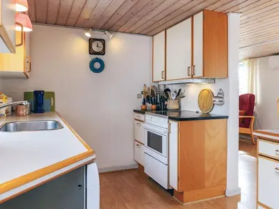 a kitchen with a sink and a stove at 6 person holiday home in Vestervig in Vestervig