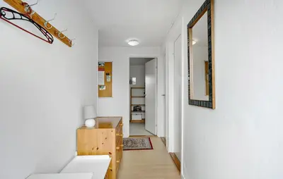 a room with a hallway with a mirror and a table at Awesome Home In Harboøre in Harboør