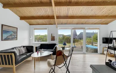 a living room with a couch and a table at Pet Friendly Home In Thisted With Wifi in Thisted