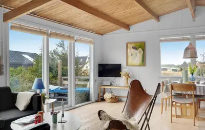 a living room with a couch and a table at Pet Friendly Home In Thisted With Wifi in Thisted