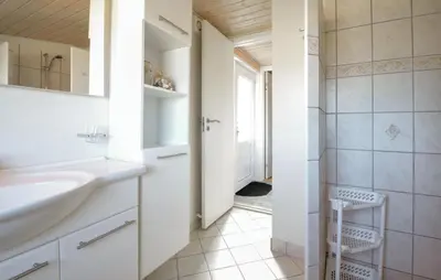 a bathroom with a sink and a shower at 2 Bedroom Pet Friendly Home In Thisted in Thisted
