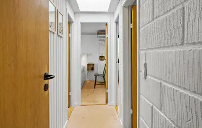 a hallway of a house with a door at 3 Bedroom Nice Home In Harboøre in Harboør