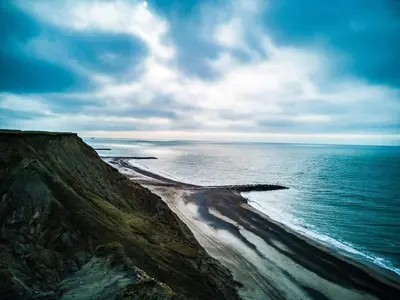 a view of the ocean and a sandy beach at 4 star holiday home in Harboøre in Harboør