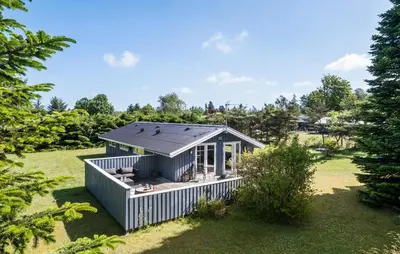 a tiny house with a solarium in a yard at 3 Bedroom Nice Home In Fjerritslev in Fjerritslev