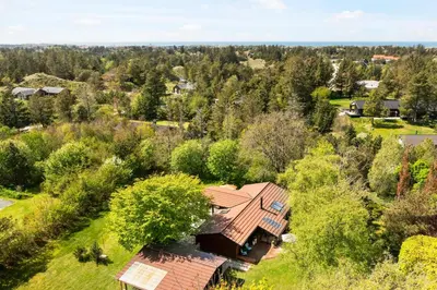 an overhead view of a house in the trees at Granlien 3, A Holiday Home With Soul And Charm! in Blokhus