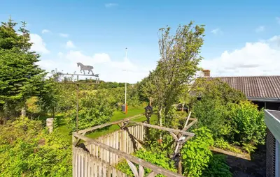 a horse statue on top of a fence at 2 Bedroom Pet Friendly Home In Thisted in Thisted