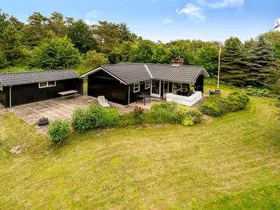 an aerial view of a house with a yard at Holiday Home Ginette - 400m to the fjord by Interhome in Åbybro