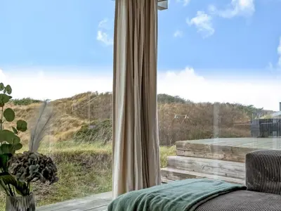 a large window with a view of the ocean at Holiday Home Marcus - 500m from the sea by Interhome in Saltum