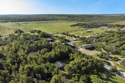 an aerial view of a park with trees and buildings at 1067-Thisted-Gra-Rimme-7 in Torsted