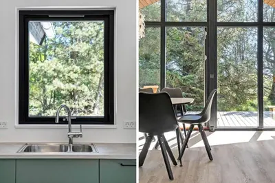 a kitchen with a sink and a table and a window at 1323-Thisted-Fiskervej-96 in Thisted
